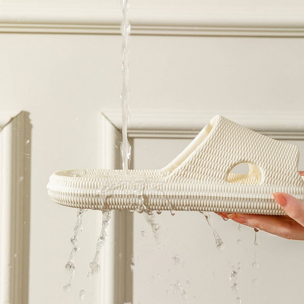 SOFT-SOLED ANTI-SLIP BATHROOM HOLLOW SLIPPERS